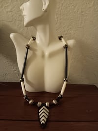 Image 6 of BLACK & WHITE BUFFALO BONE PIPE AND ROUND BEADS AND WATER BUFFALO BONE ARROWHEAD W/INLAY