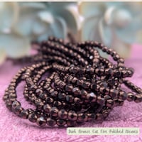Image 2 of 4mm Czech Cut Fire Polished Bicones – [COLOR] – Strand of 50