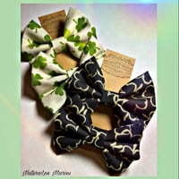 Image 1 of St. Patrick’s Day Hairbow Set of 4: 2 Ivory Green Clover and 2 Gold Glitter Black Clover Hairbows