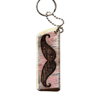 Image 1 of hipster mustache and 3 wheeled unicycle keychain 