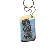 Image 1 of evil ass scorpion and 3 cute kittens key chain