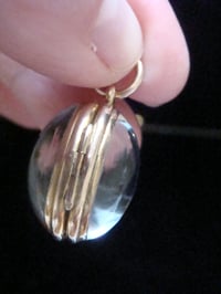 Image 4 of Edwardian 9ct rolled gold heavy thick rounded pools of light crystal locket