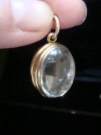 Image 7 of Edwardian 9ct rolled gold heavy thick rounded pools of light crystal locket
