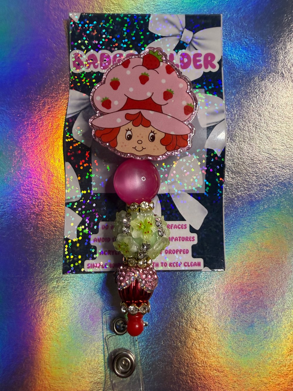Image of Strawberry Girl badge reel