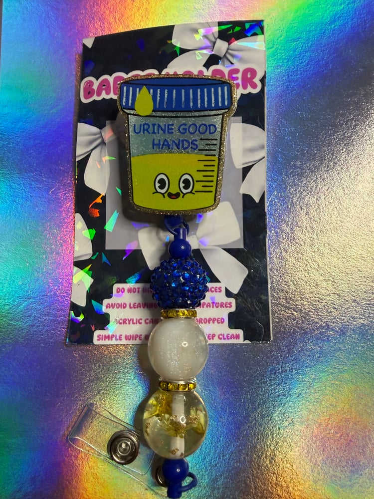 Image of Sample cup badge reel