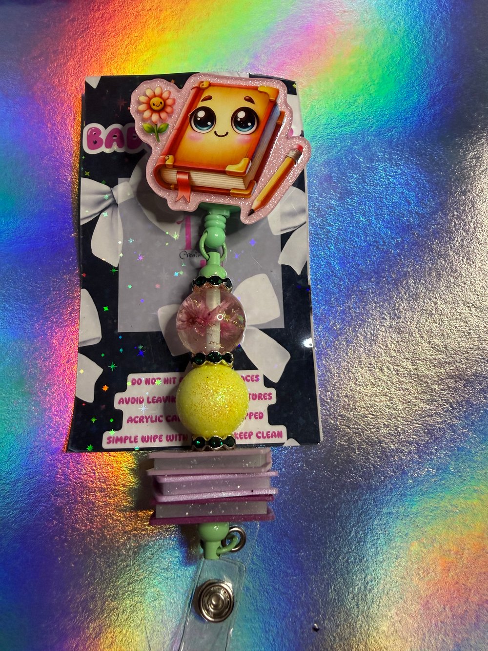 Image of Book badge reel