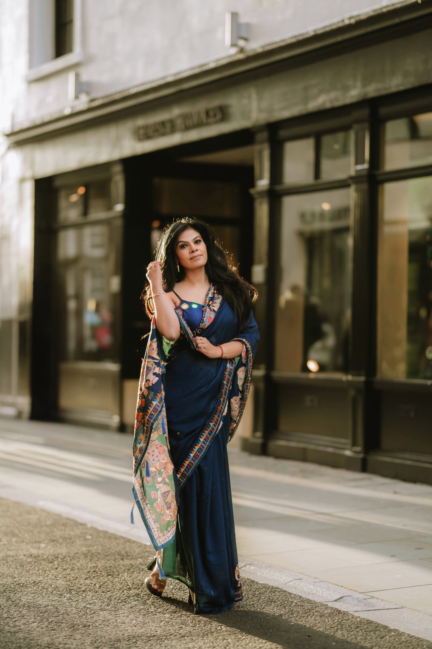 Image of TEAL BLUE SAREE WITH EMBROIDERED PATTERNS 