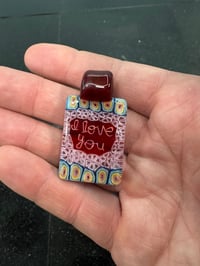 Image 1 of Reg. size rainbow bullseye and pink I Love you