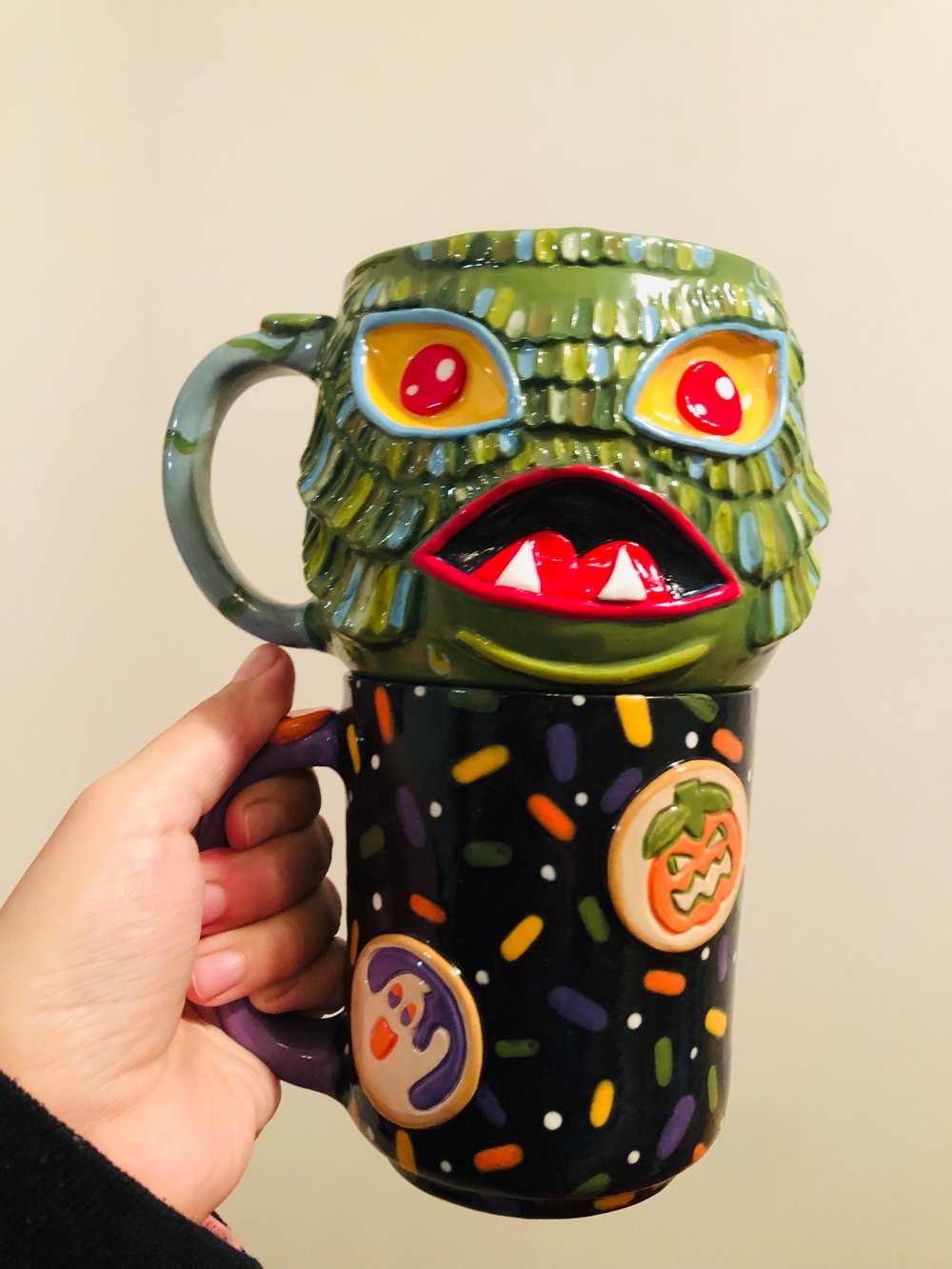 Image of Halloween cookie and creature for Sweet tooth bakery