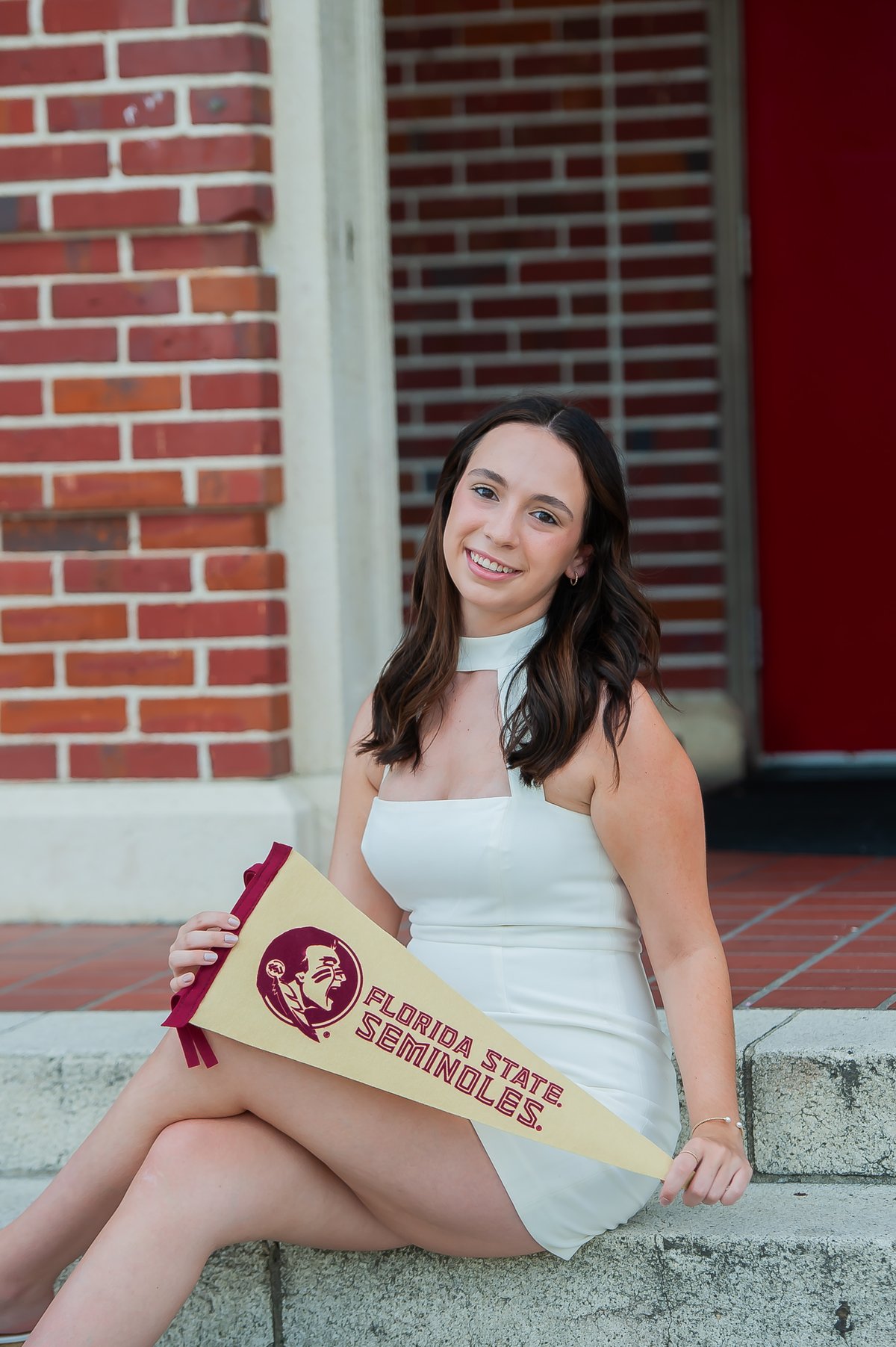 Image of  Cap and Gown Mini Sessions- April 21st Leon High School - Cap and Gown available to borrow