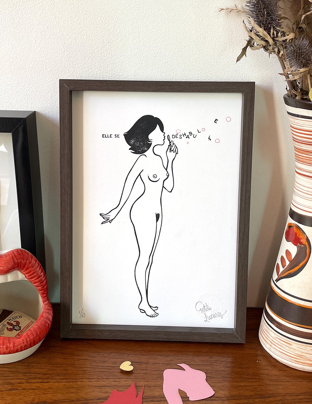 Image of "Elle Se Déshabulle" tirage en linogravure et découpages interactifs