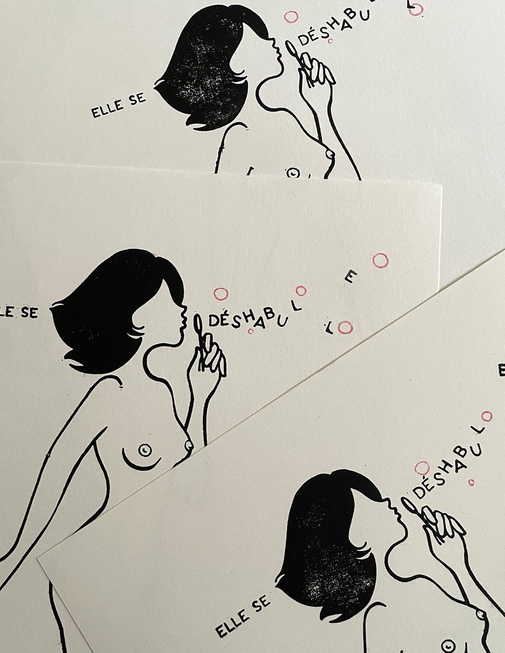 Image of "Elle Se Déshabulle" tirage en linogravure et découpages interactifs