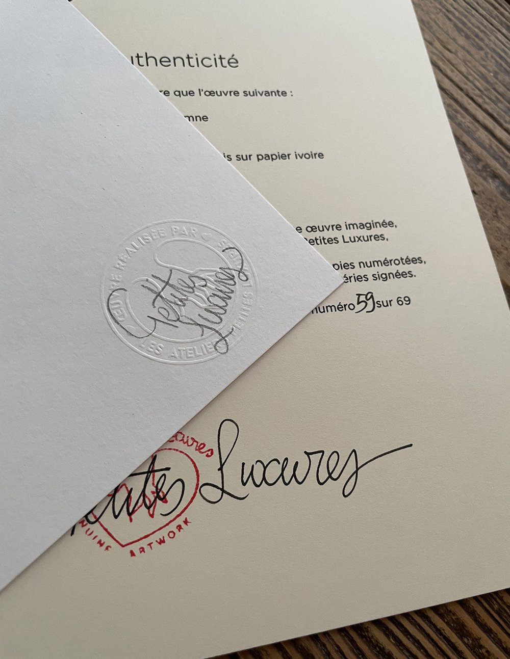 Image of "Elle Se Déshabulle" tirage en linogravure et découpages interactifs