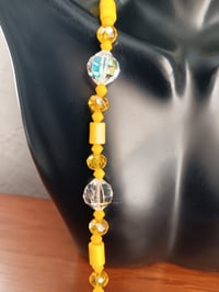 Image 3 of CLEAR SWAROVSKI AB ROCKY BEADS, MINI SWAROSKI BICONES, YELLOW HOWLITE TUBES, YELLOW CRYSTAL BEADS 