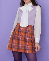 Image 20 of Ivory flower button bow blouse