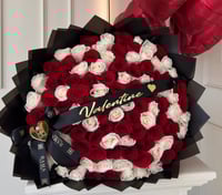 50 roses 3 balloons. Ribbon custom let us know what it will say 