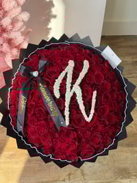 100 red roses with glitter and initial A