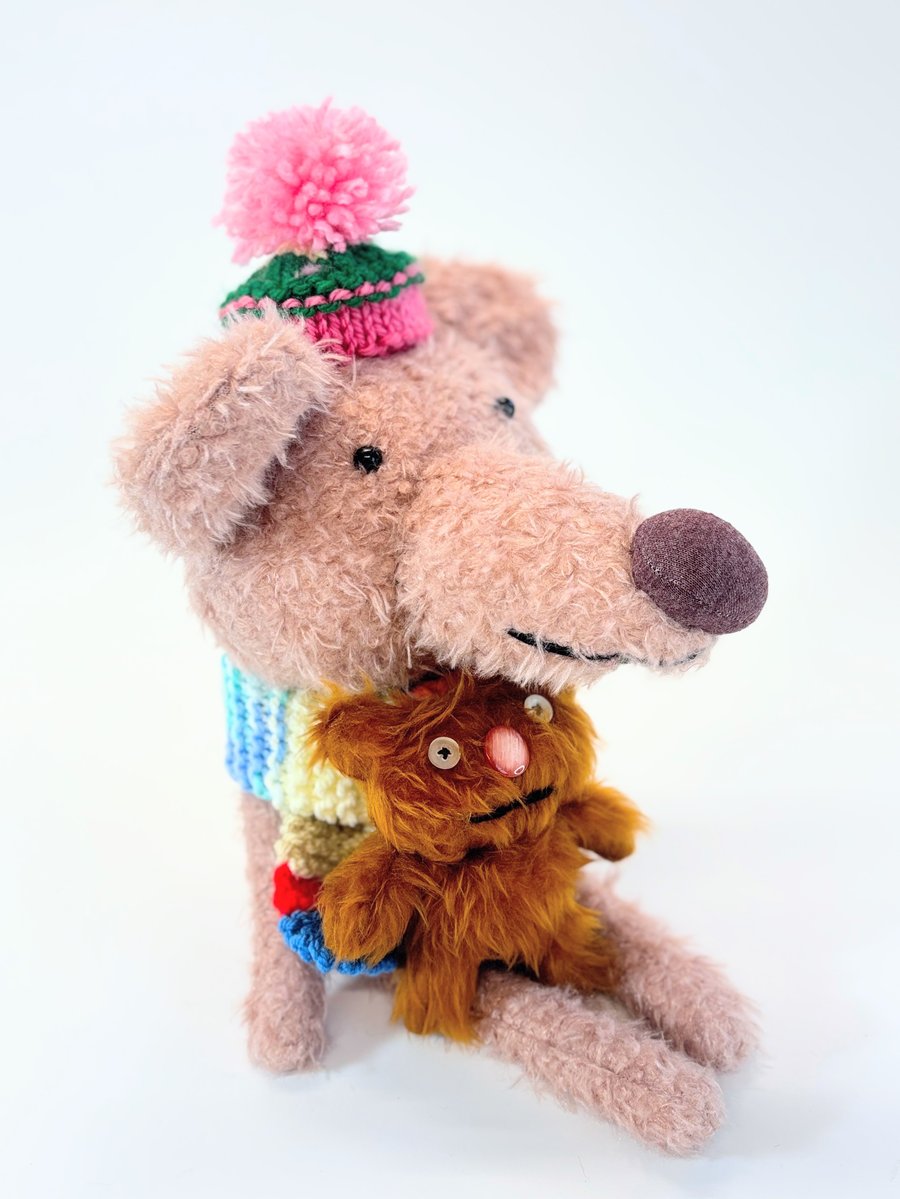Image of Ryan the long nose bear and his teddy 