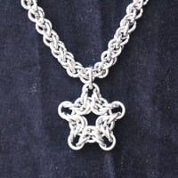 Image 1 of Stainless steel chainmail neck chain with moving star pendant.