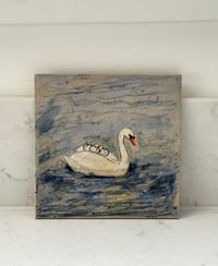 Image 3 of The swan,carring 