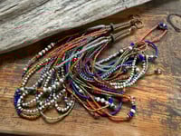 Image 1 of ‘Movement' . Beaded Tassel  earrings II