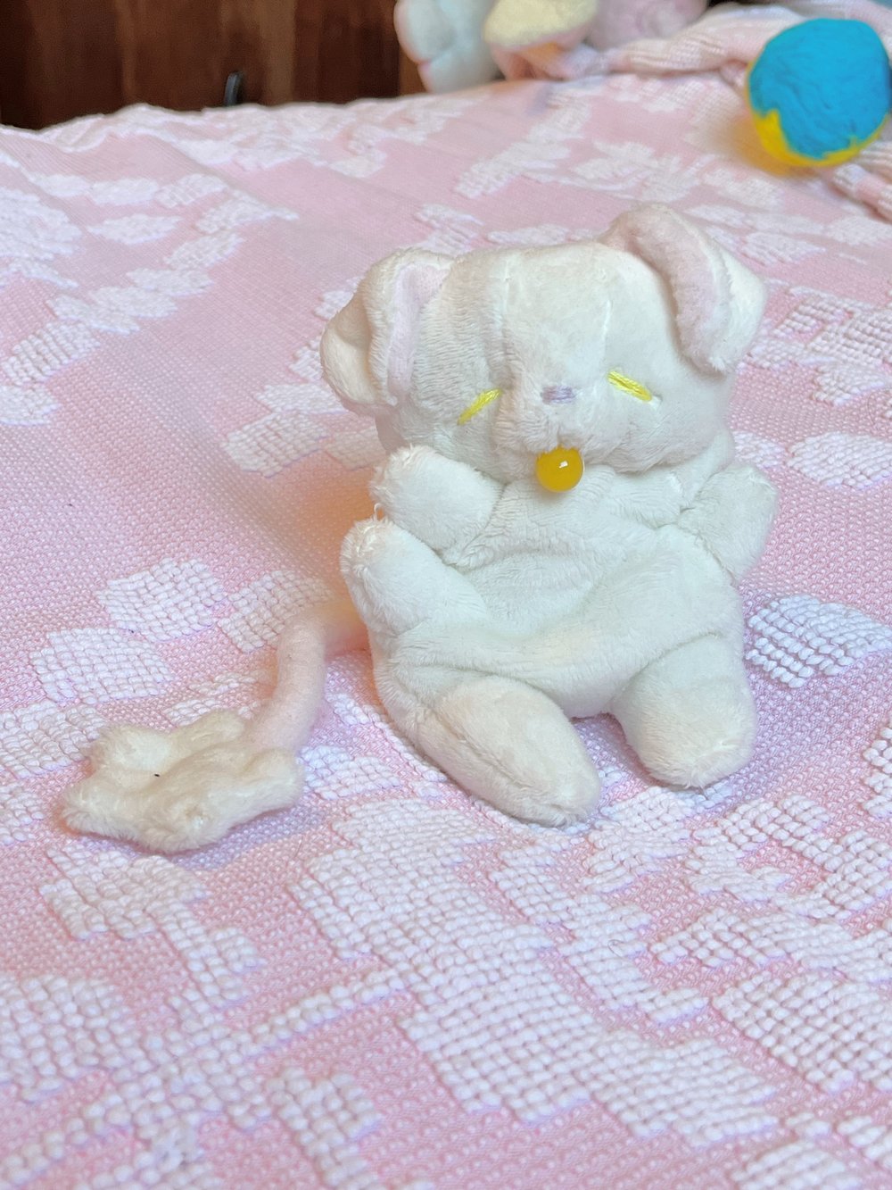 Image of Hugg-A-Me Babey! White with yellow binkie