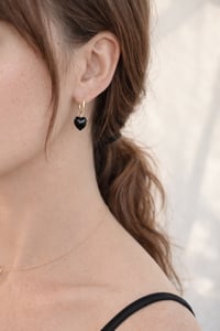 Image 2 of Soft Orbit Black Onyx Heart Drop Huggies