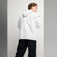 Image 1 of veste à capuche blanche et rouge