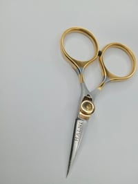 Adjustable scissors 