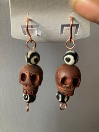 Image 2 of Wood Skull Earrings