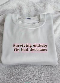 Surviving entirely on bad decisions sweater
