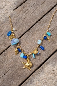 Image 2 of Ocean Treasure Gold Charm Necklace – Starfish & Shell Beaded Statement Necklace