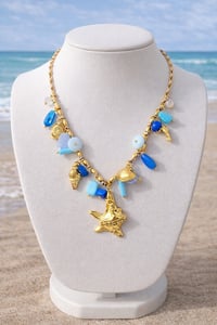 Image 3 of Ocean Treasure Gold Charm Necklace – Starfish & Shell Beaded Statement Necklace