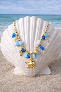 Image 4 of Ocean Treasure Gold Charm Necklace – Starfish & Shell Beaded Statement Necklace