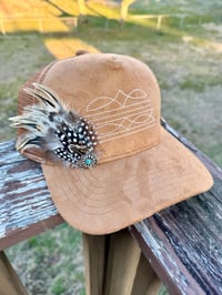 Image 6 of Feather Trucker Hat Collection