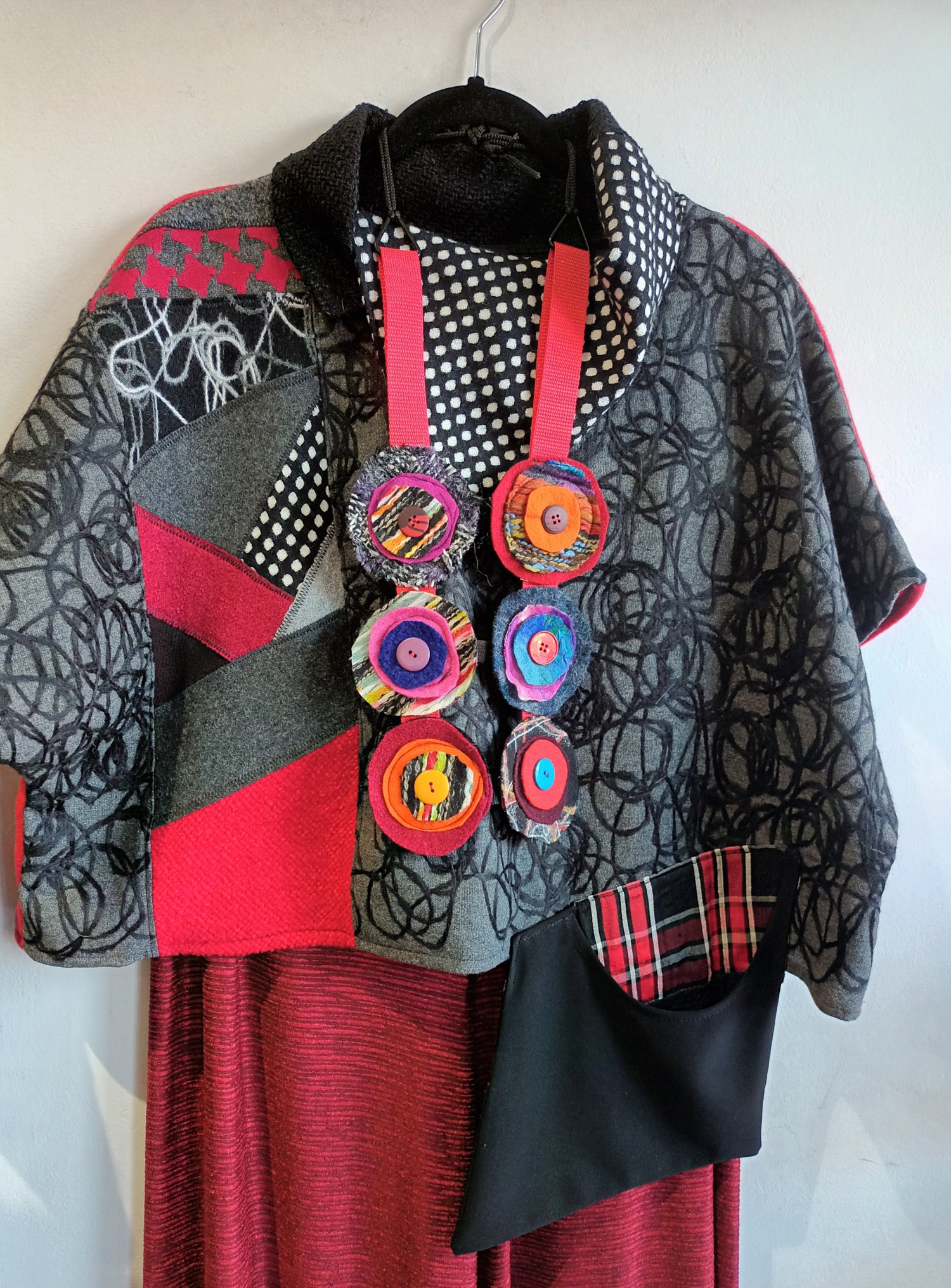 Image of fabric collage cropped top black, red and grey