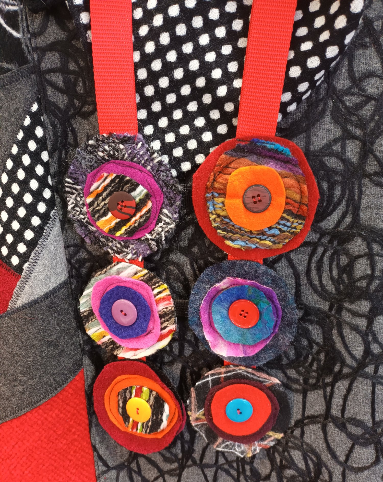 Image of fabric collage cropped top black, red and grey