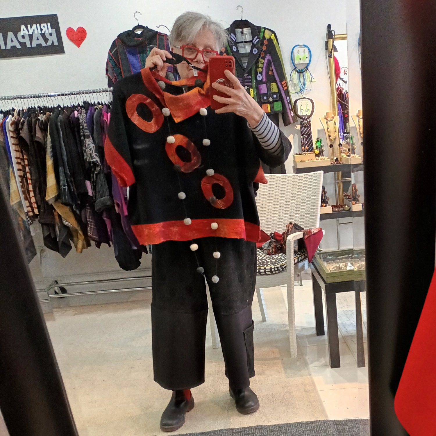 Image of black and red sweater