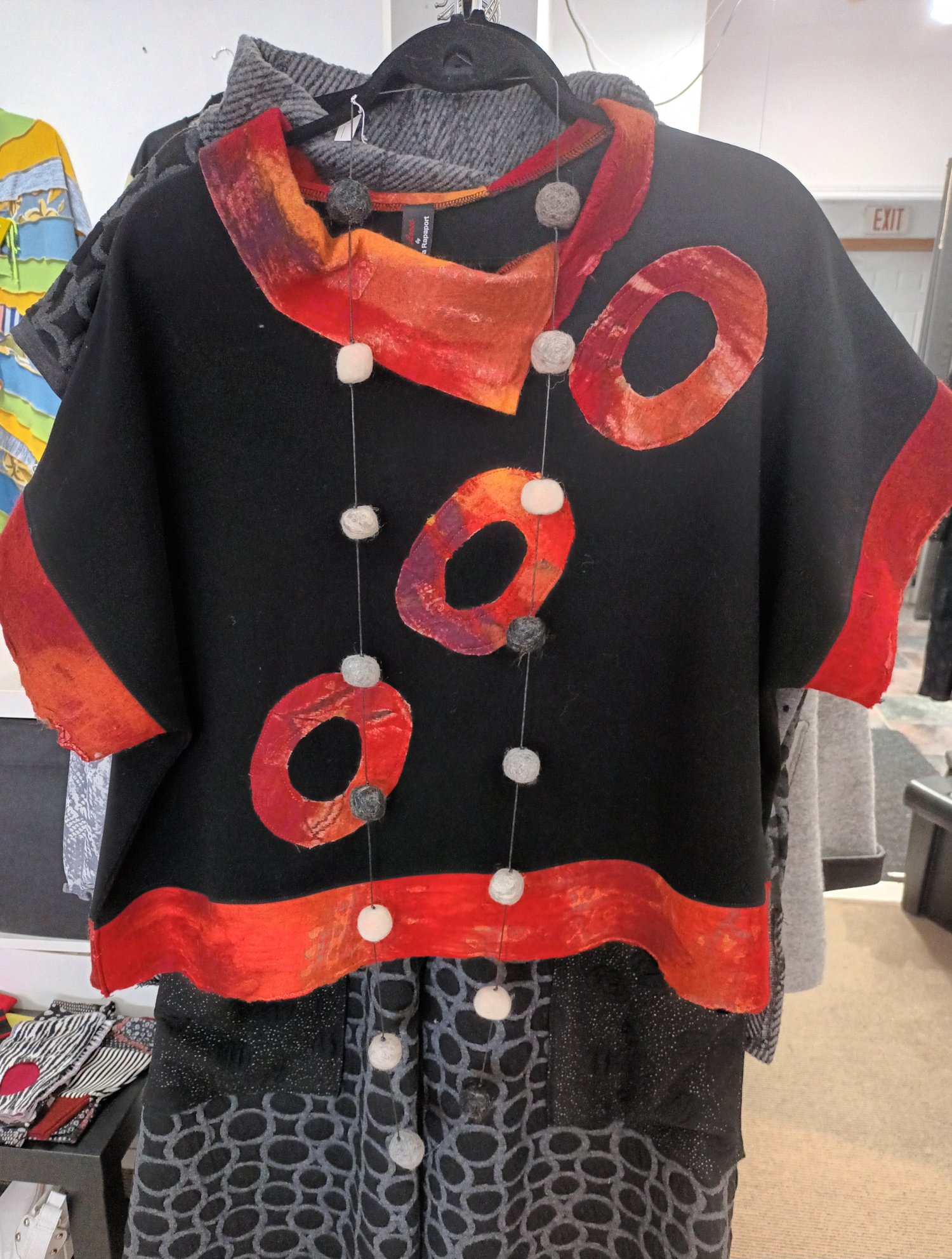 Image of black and red sweater