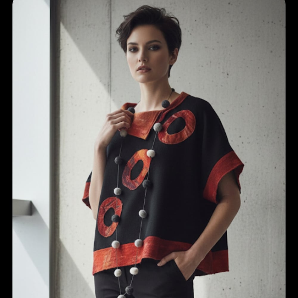 Image of black and red sweater