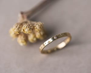 Image of 18ct Yellow gold 2mm ‘Star' Eternity ring