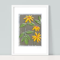 Yellow Rudbeckia on grey texured ground