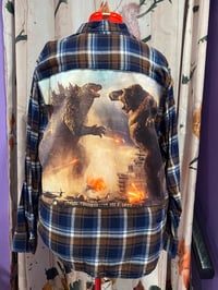 Image 1 of Lizard vs Ape