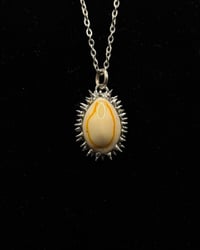 Image 1 of Spiked Gold Ring Cowrie Pendant no. 001