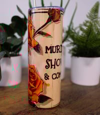 Image 1 of Handmade Murder Shows and Comfy Clothes 20oz Stainless Steel Tumbler, skeleton, rose, cup