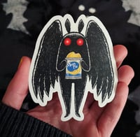 Image 1 of moon pie mothman sticker