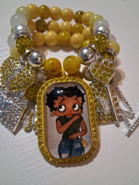 Image 2 of Betty B in jeans on yellow 