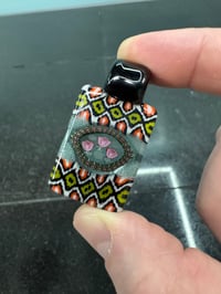 Image 1 of Reg size three roses with tribal pattern