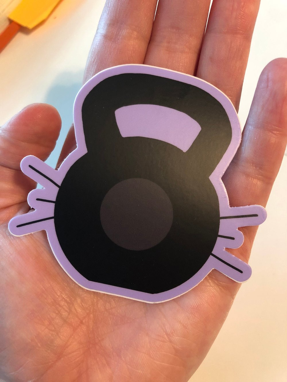 Image of Kettlebell with Whiskers, Cattlebell, Kittlebell, Three-Inch Sticker