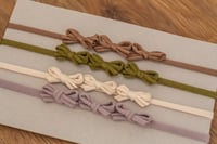 Image 1 of Three Bow Stretch Tieback 